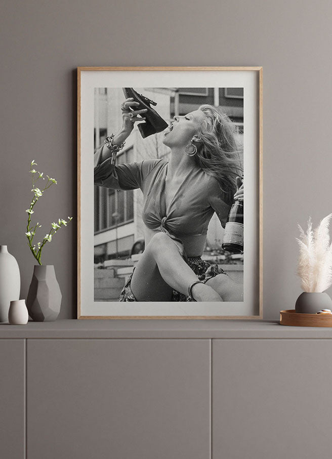 VICKI HODGE DRINKING CHAMPAGNE