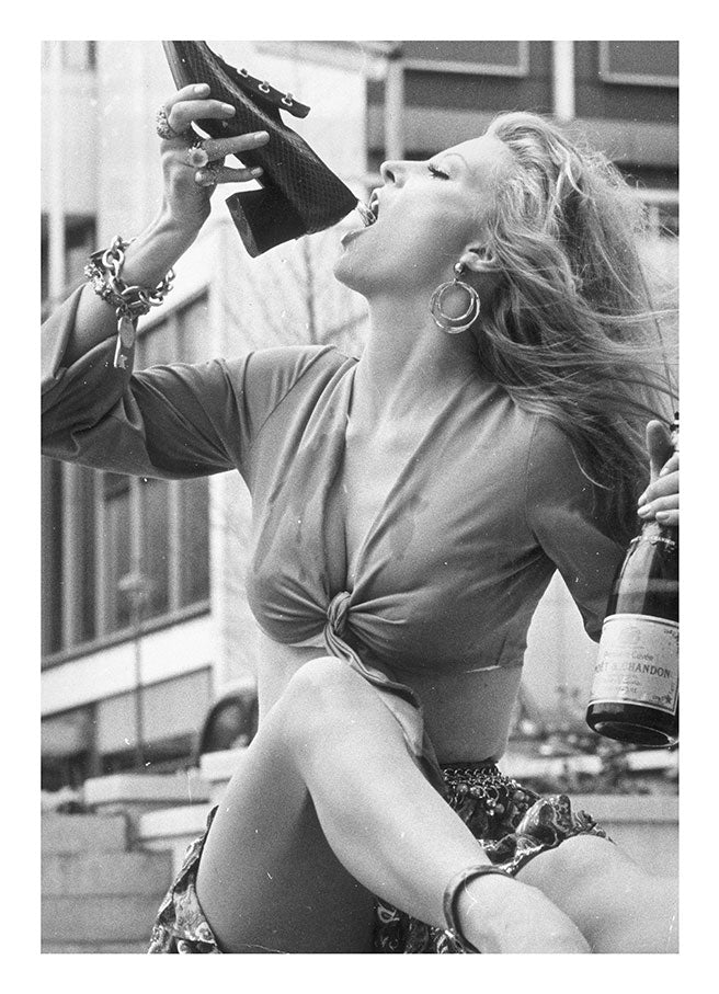 VICKI HODGE DRINKING CHAMPAGNE